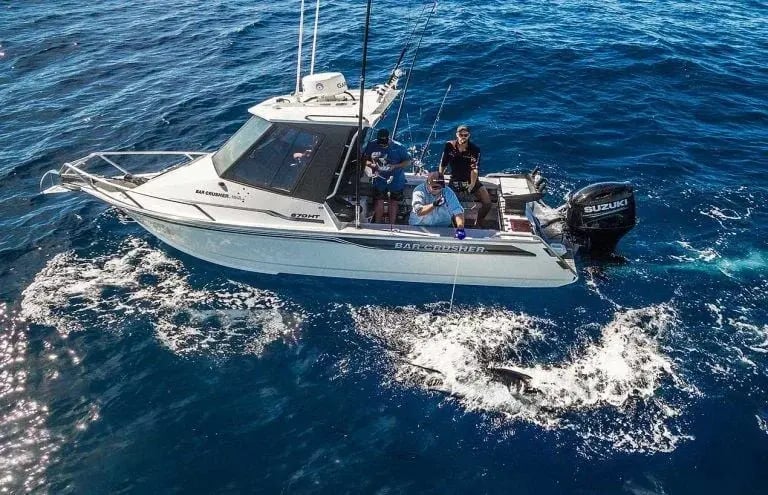 3 men fishing on an HT Series boat