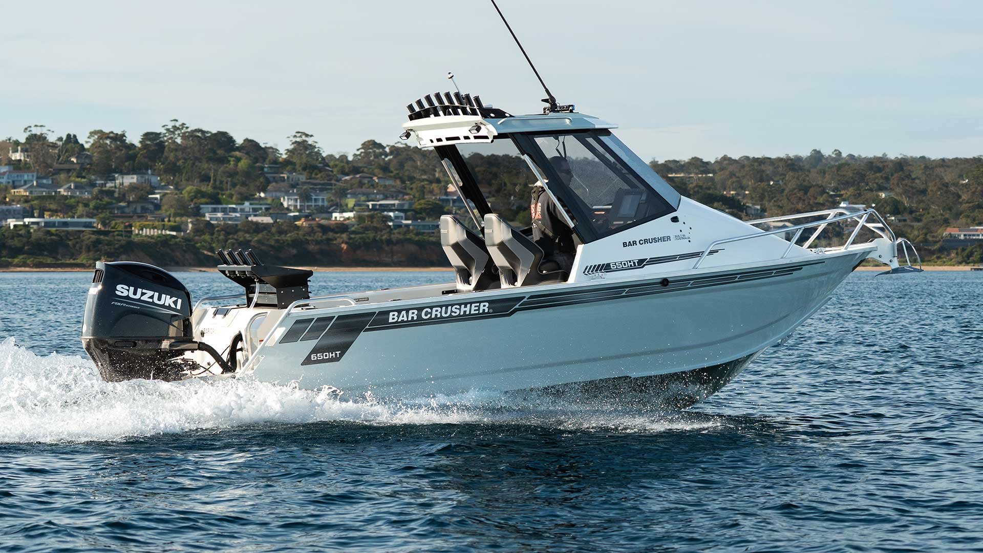 Bar Crusher 650HT underway with cliffs in background